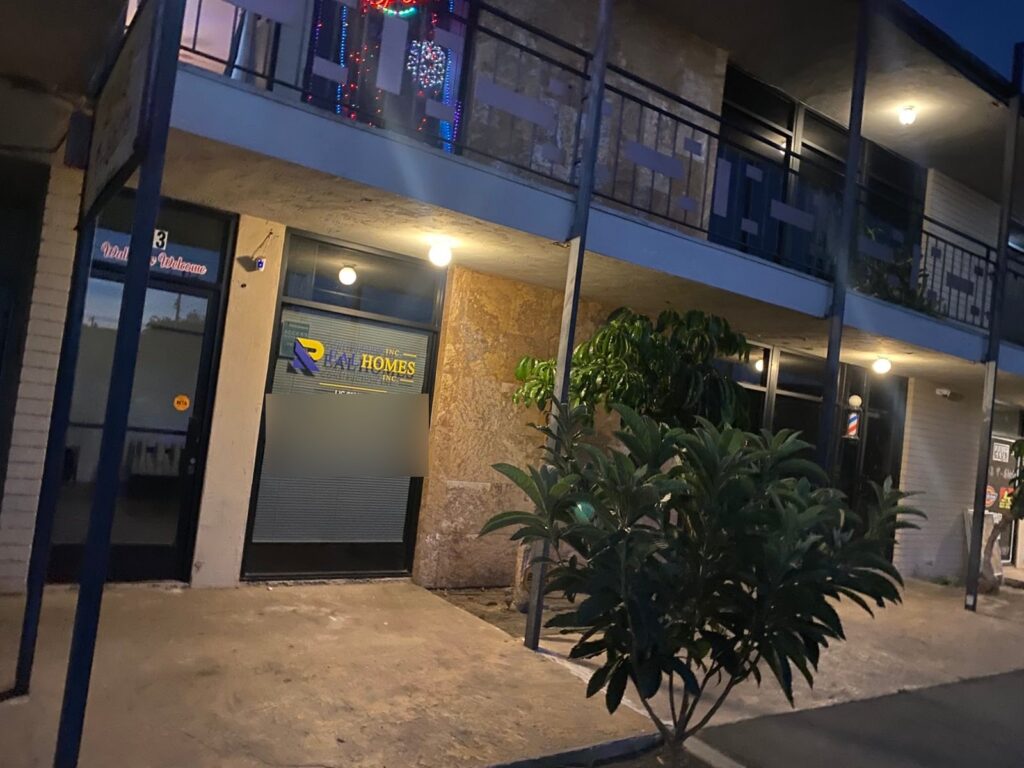 RealHomes Construction office on W Lincoln Ave, Anaheim, in the evening