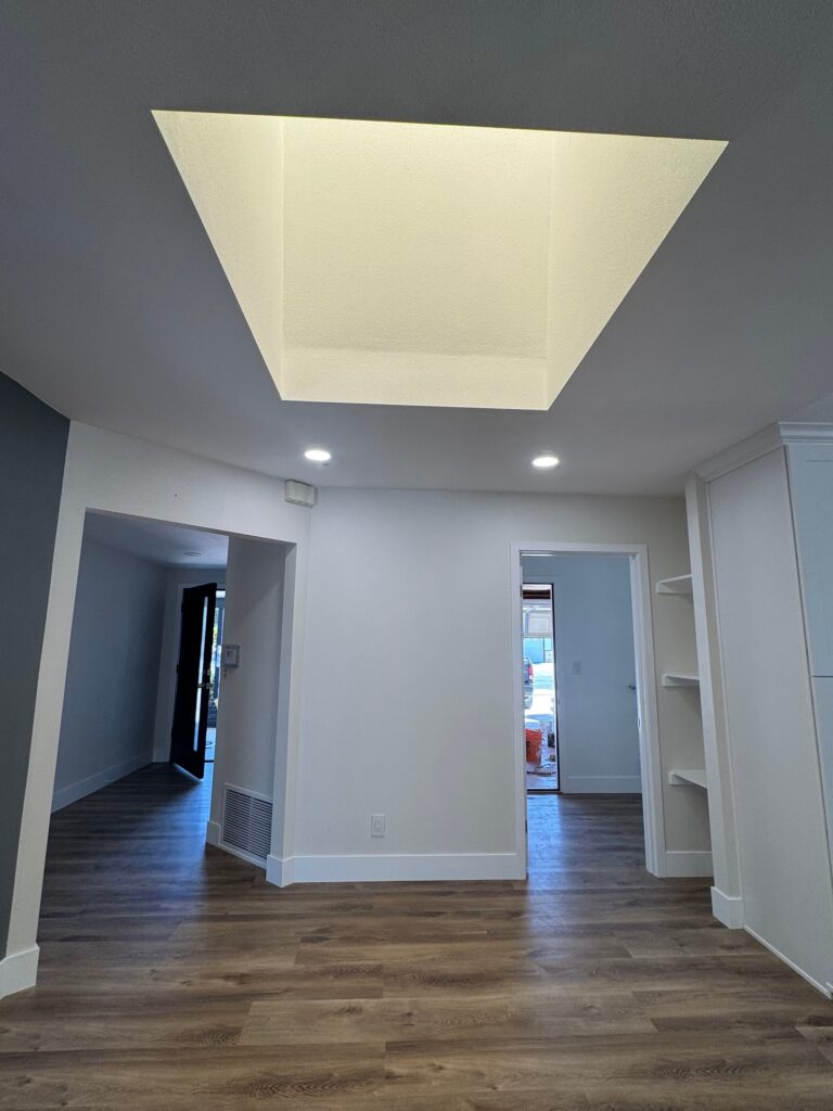 Hallway with skylight after whole-home remodel, Anaheim, CA